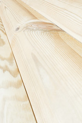 The light beige plank. The wood texture. The background. The diagonal plank.