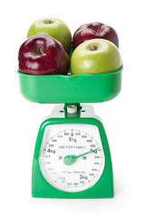 family scale measuring apples