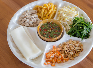 Fresh vegetables, beans, flour, complementing the food plate Tha