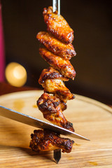 Grilled meat on a skewer. Close up
