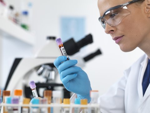 Scientist with blood sample