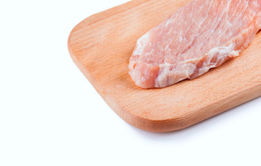 piece of fresh raw meat on wooden Board isolated