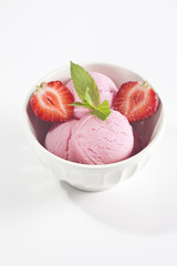 Strawberry ice cream and strawberries.