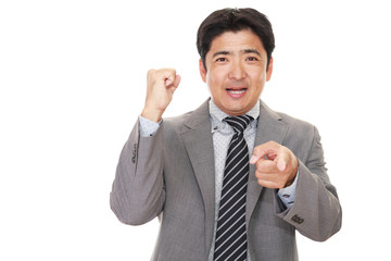 ガッツポーズのビジネスマン