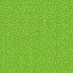 Seamless pattern of stylized leaves in green and olive colors