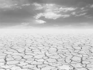 Cracked ground and sunset black and white