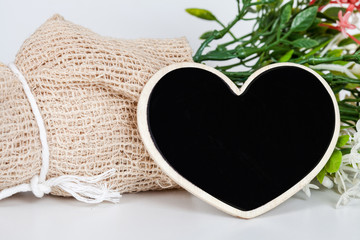Bouquet of dried flowers with wooden heart shape