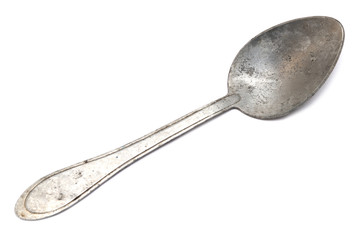 old spoon on white