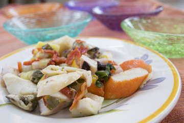 mixed seafood salad in a white dish