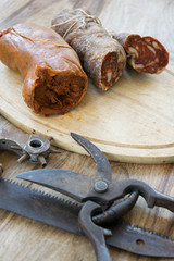 nduja and soppressata salami with old working tools