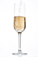 champagne falling in champagne flute.