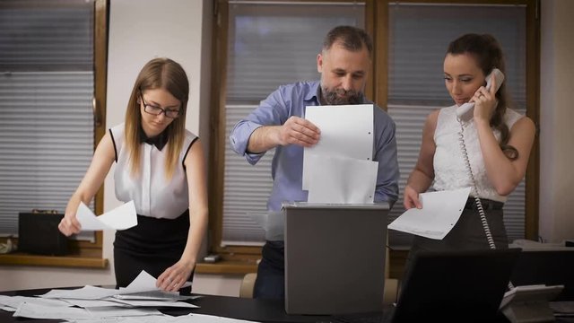The director and his assistants in a panic kill reports. Destruction of evidence of financial crimes. 