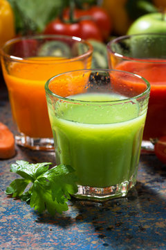 assortment of fresh vegetable juices, vertical