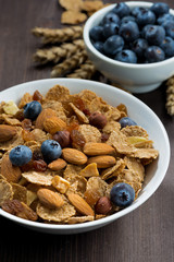 breakfast cereal flakes with blueberries and nuts 
