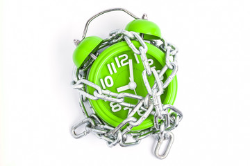 Alarm clock with chain on white background