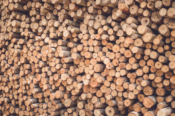 Stacked of wood log  for construction buildings background