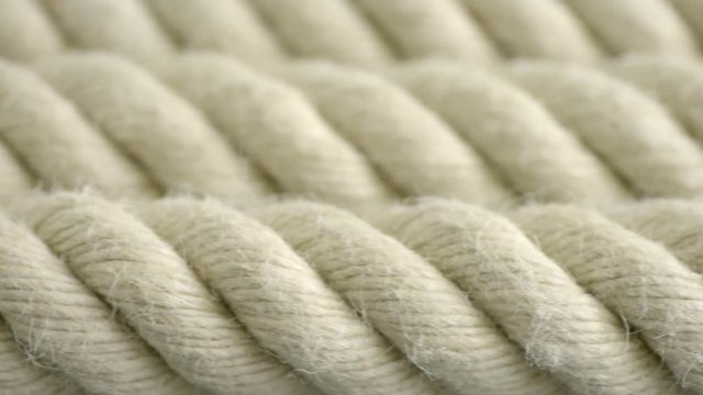 Strong rope. Film clip with slow sliding motion. Symbol of strength, marine equipment and connection.