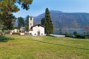 Fototapeta na wymiar Italy, church of Brusimpiano on Lake Lugano-Ceresio. Location between Ponte Tresa and Porto Ceresio on the border with Switzerland 