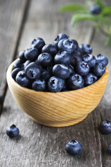 Blueberry on a dark wooden background