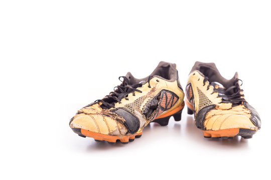 Old Football Shoes Isolated On White