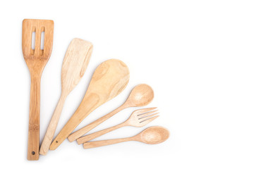 Close up wooden spoon and fork isolated on white