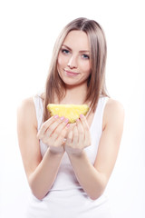 Girl holding a pineapple