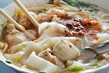 large noodle with pork soup fill seasoning and ready to eat