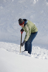 Man Shoveling on Sidewalk