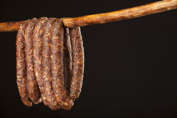hanging smoked domestic traditional sausage - obrazy, fototapety, plakaty