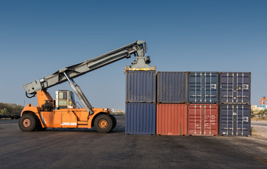 Forklift handling the containers box