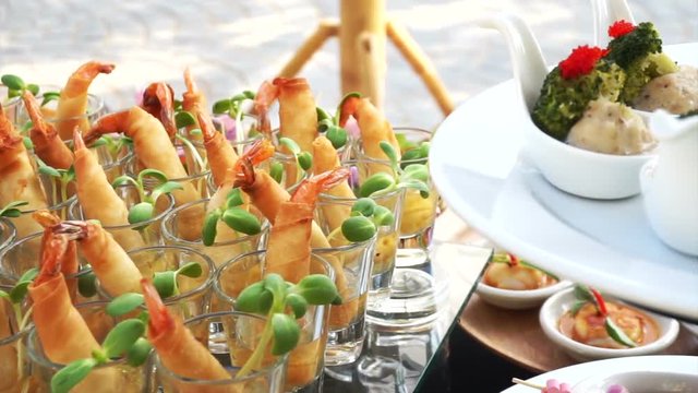 Assortment of Thai on Catering Buffet. Finger food fried spring roll for cocktail party appetisers 