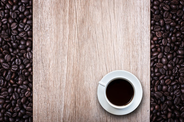 White coffee cup on wooden table top view