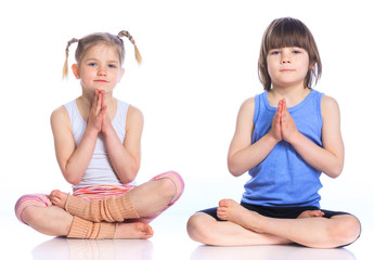 Obraz na płótnie Canvas Kids practice yoga