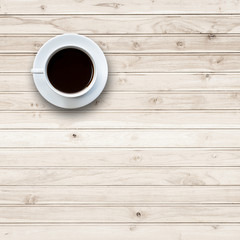 White coffee cup on wooden table top view