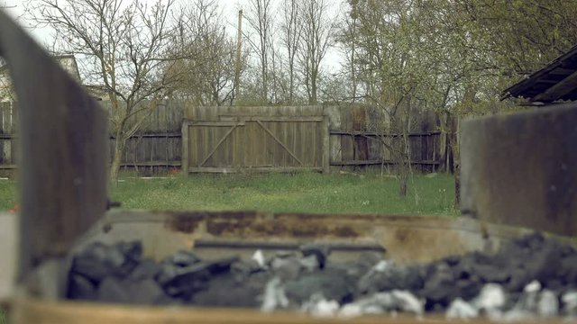Mirage. Hot air haze shimmer over barbecue bbq brazier. Nature physics phenomena and picnic concept. 4K UHD video footage.