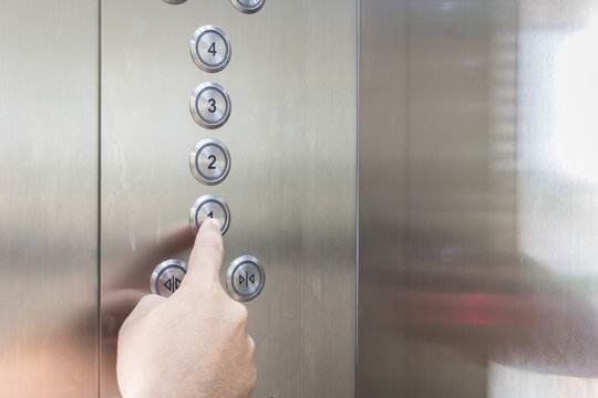 Hand Pressing Silver Elevator Button