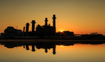 Gas turbine electrical power plant with sunset © mathisa