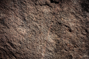 Stone background, rock wall backdrop with rough texture. Abstract, grungy and textured surface of...