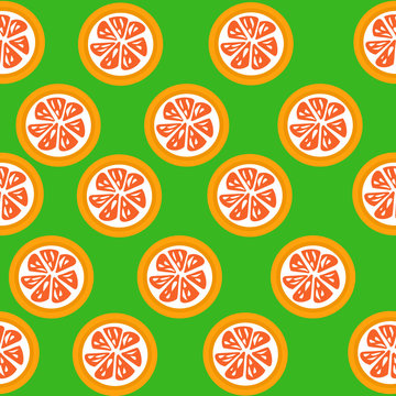 Grapefruit  slices seamless on green background