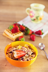 A bowl of cereals with fruit 