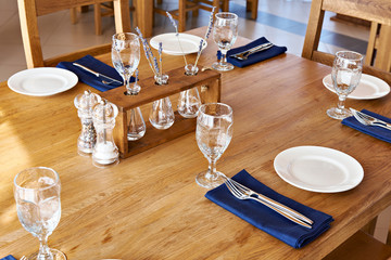 Serving dinner table in restaurant