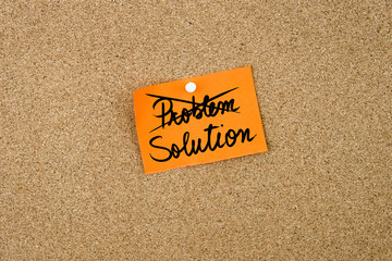 Solution written on orange paper note
