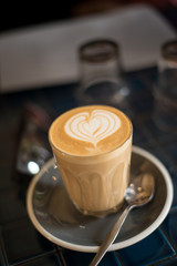 Latte art coffee with heart.