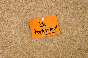 Be Professional written on orange paper note