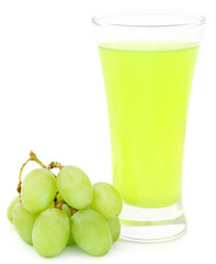 Fototapeta na wymiar Grape juice in a glass with fresh fruits
