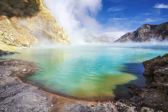 Ijen Lake, the largest acidic lake in the world, at Kawah Ijen volcano, East Java, Indonesia. - Powered by Adobe