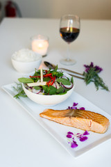 Thai style food, steak salmon with Thai salad.
