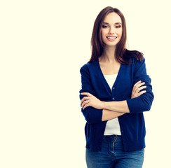 smiling young woman with crossed arms