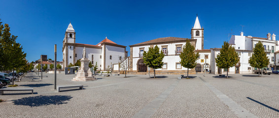 Dom Pedro V Square in Castelo de Vide. Santa Maria da Devesa church (left) and City-Hall (center). Alto Alentejo, Portugal