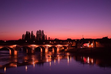 Fototapeta premium Sunset over the river in Amboise, France 